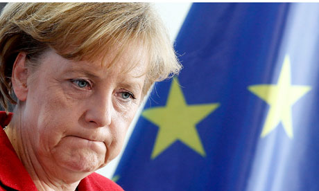 Angela Merkel slumps to defeat in home state elections