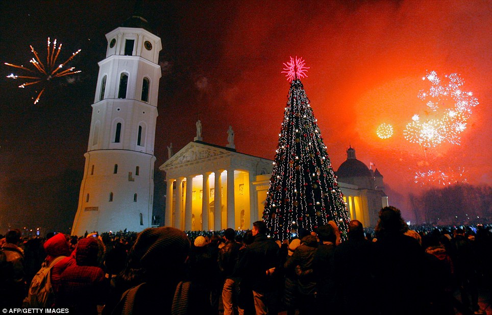 LITHUANIA: Fireworks light the sky above the Cathedral square in Vilnius during the New Year celebrations