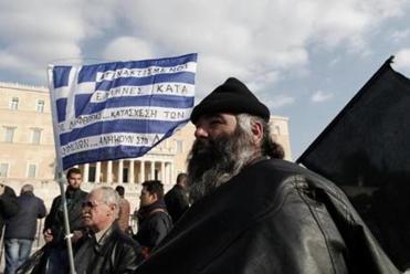 After Greece instituted tax hikes, demonstrators rallied outside Parliament against the increases, claiming that they were being driven out of business. 