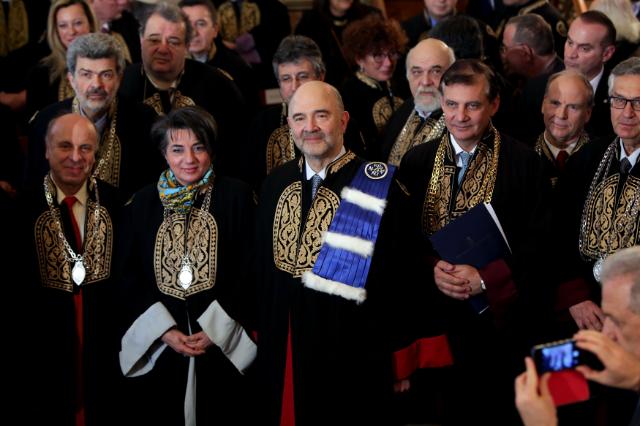 Pierre Moscovici, in the center, during the ceremony of proclamation as Doctor honoris causa, at the University of Athens.